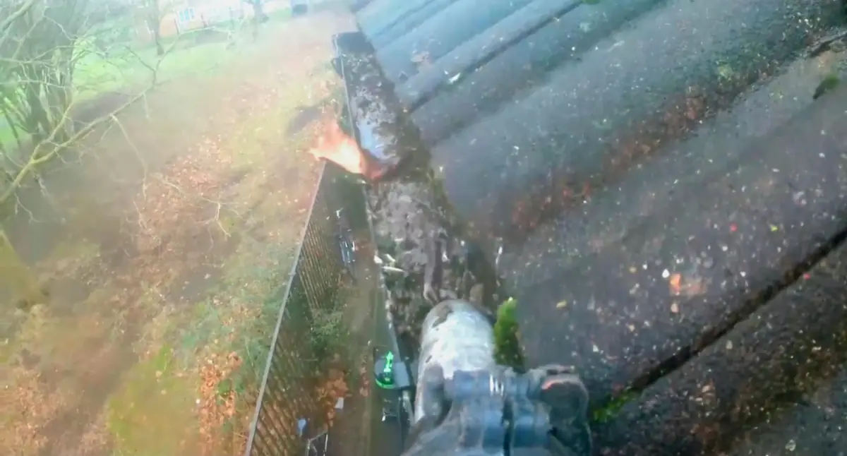 Blocked gutter before cleaning
